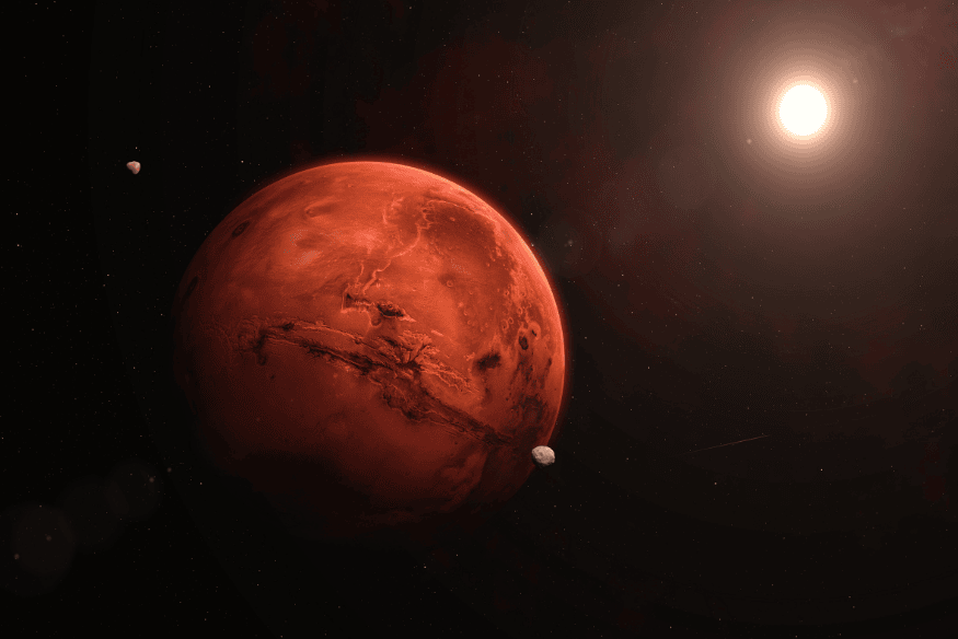 Marte iluminado pelo Sol no espaço, com sua coloração vermelha em destaque e pequenos corpos celestes ao redor.